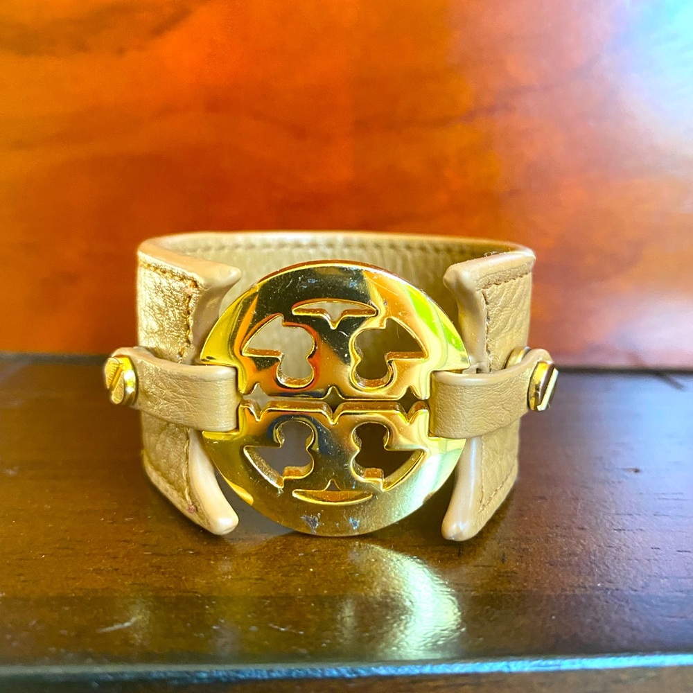 Tory Burch leather bracket with gold logo medallion